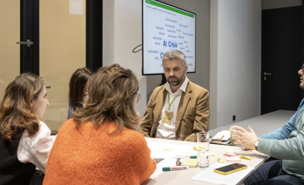 Participants at the foresight workshop in Bratislava discussing the futures presented in the videos